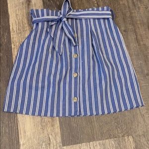 blue jean and white vertically striped skirt